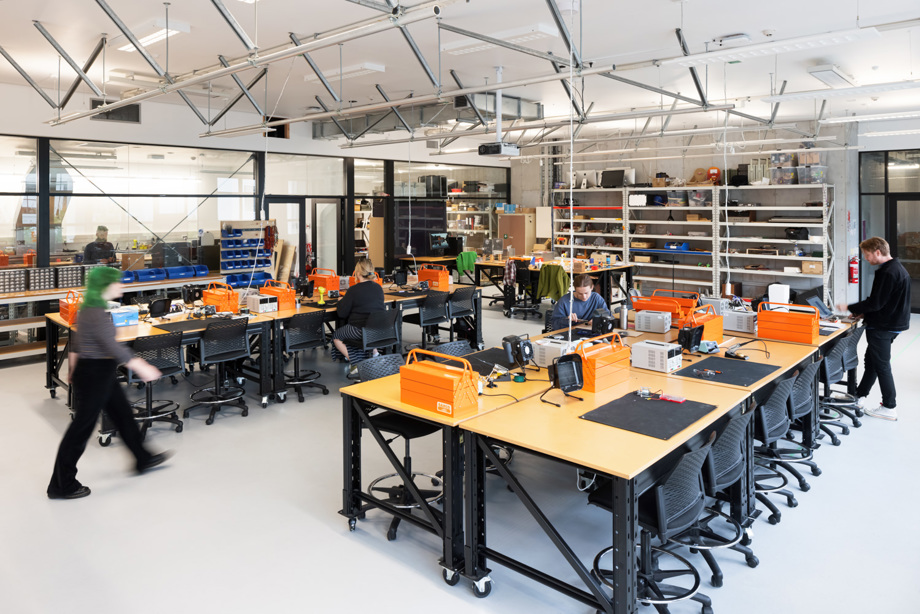 Music technology lab Lab filled with desks with toolkits and soldering equipment